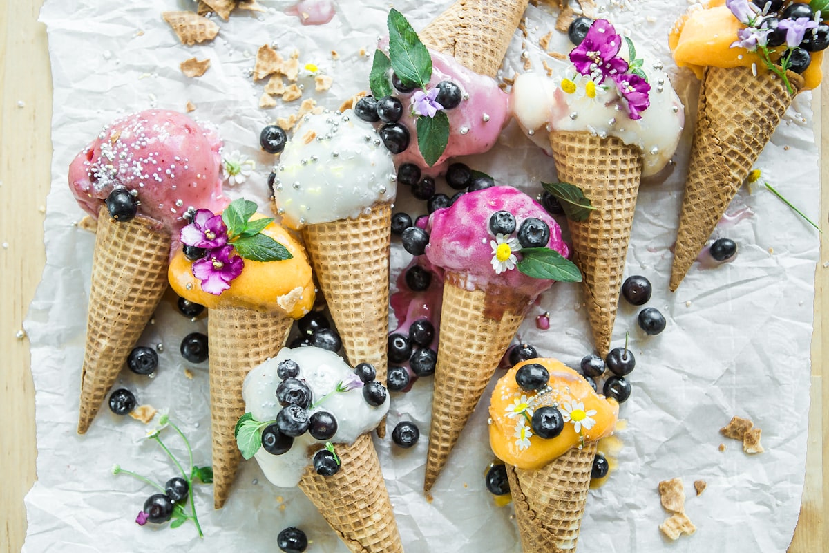 Vibrant artisan gelato display — Coconut Passionfruit and more